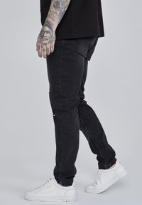 SIKSILK DISTRESSED - Straight leg jeans - washed black