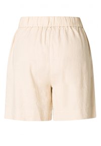 Beige linnen shorts met een elastische tailleband, met een zachte textuur en een relaxte pasvorm. Afgewerkt aan de zijkanten zonder versieringen.