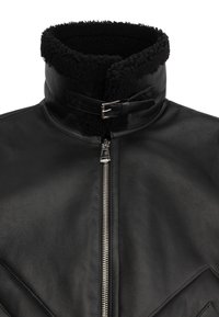 Black leather jacket with a high, shearling-lined collar, a front zipper, and angular chest design detail. Features a belt buckle accent.