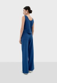 Thinking Mu MANOLITA - Pantaloni - blue