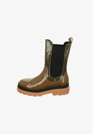 Brown patent leather ankle boot with black elastic panels, textured sole, and beige tread. Features a pull tab at the back for ease of wear.