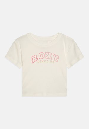 Kreemivärvi puuvillane T-särk lühikeste varrukatega. Suurel roosat ja kollast värvi "ROXY" logo. Ümmargune kaelus, lühike lõige, sile tekstuur.