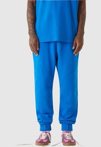 UNISEX  ESSENTIAL  - Tepláky - blue