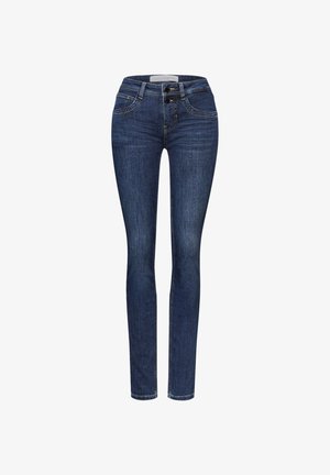 Jean skinny en denim bleu foncé, avec une taille haute, deux poches avant, des détails de couture subtils et une fermeture à deux boutons.