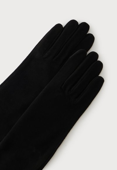 Paire de longs gants noirs avec une texture de tissu lisse, posés à plat sur un fond blanc.