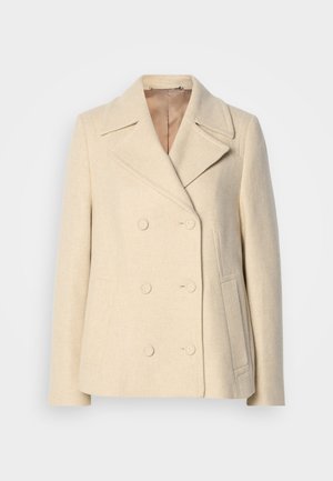 Többgombos bézs gyapjú kabát csúcsos hajtókával, hangsúlyos varrással, oldalsó zsebekkel és textúrált anyaggal. Bélelt belső.