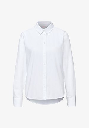 Hvid langærmet skjorte med klassisk krave, knaplukning foran og afrundet kant. Fremstillet af et glat, let stof med minimal tekstur.