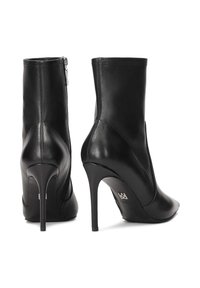 Black leather ankle boots featuring a sleek design, pointed toe, high stiletto heel, and a side zipper closure. Smooth texture with minimal accents.