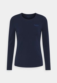 Långärmad t-shirt i marinblå bomull med rund halsringning och liten brandlogo i kontrasterande blått på bröstet. Mjuk och slät textur.