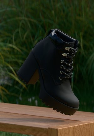 Bottines à lacets - black