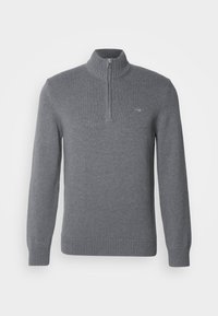 Pull en maille gris à manches longues avec col, poignets et bas en côtes, doté d'une demi-fermeture éclair à l'avant et d'un petit logo brodé sur la poitrine.