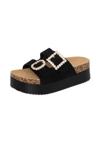 Sandales à plateforme noires en suède avec deux boucles décoratives ornées de strass clairs. Semelle en liège et en caoutchouc noir avec une texture antidérapante.