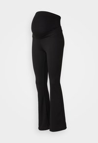 Leggings de maternité noirs avec une large ceinture extensible, un design évasé et une texture de tissu douce, adaptées pour le confort et le soutien.