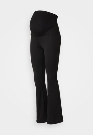 Black maternity leggings with a wide, stretchy waistband, flared design, and soft fabric texture suitable for comfort and support.
