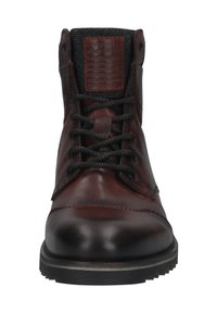 Braune Leder-Ankle-Boots mit schwarzen Schnürsenkeln, runder Zehenform und strukturiertem Innenfutter. Verfügt über ein Markenlabel auf der Zunge und eine robuste Sohle.
