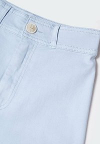 Mango Kids SEAMLESS - Flared jeans - light blue
