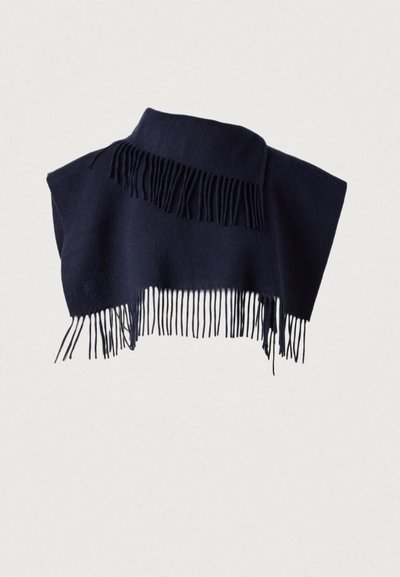 Poncho en laine bleu marine avec bordure à franges. Il présente un col montant et un design asymétrique, offrant chaleur et texture.