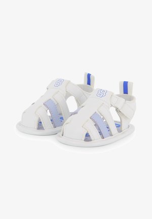 Witte leren sandalen met een opengewerkt ontwerp, blauwe accenten en een verstelbare band; textuurrzool met demping voor comfort.