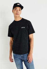 Levi's® VINTAGE FIT GRAPHIC - Nyomott mintás póló - black
