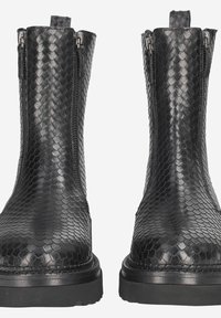 Black ankle boots with a reptile skin texture, featuring dual side zippers and a sturdy rubber sole. Smooth finish and rounded toe design.