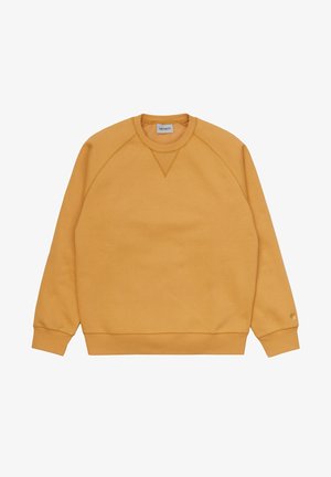 Mosterdgele sweater met ronde hals, geribbelde manchetten en zoom, zichtbare stiknaden en een klein logo op de linkermouwmanchet.