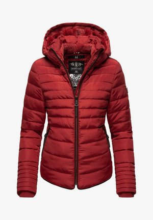 Red padded jacket with a hood, featuring horizontal quilted design, side pockets, and ribbed cuffs. Soft faux fur lining visible inside.