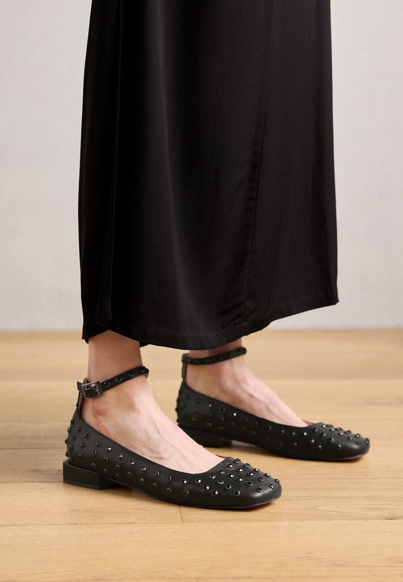 Ballerine con cinturino