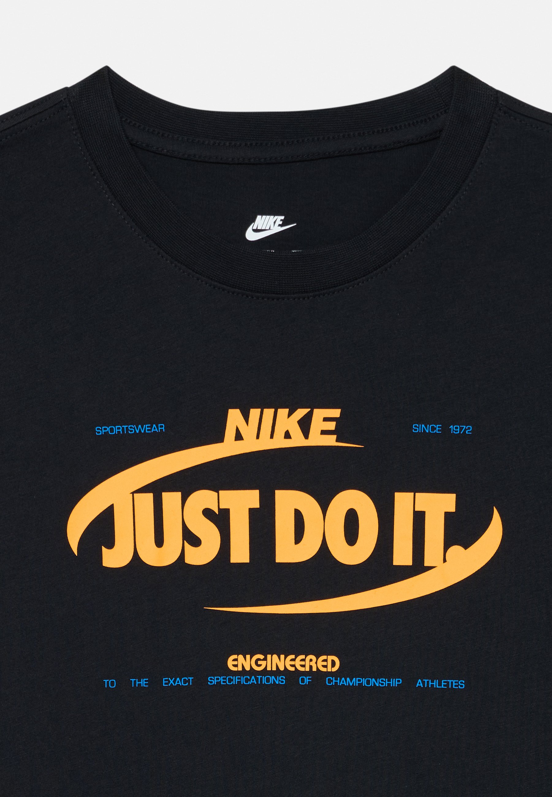 black and orange just do it shirt