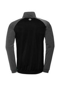 Black and gray long-sleeve jacket with a high collar, featuring textured fabric on shoulders and a patterned accent in gray.