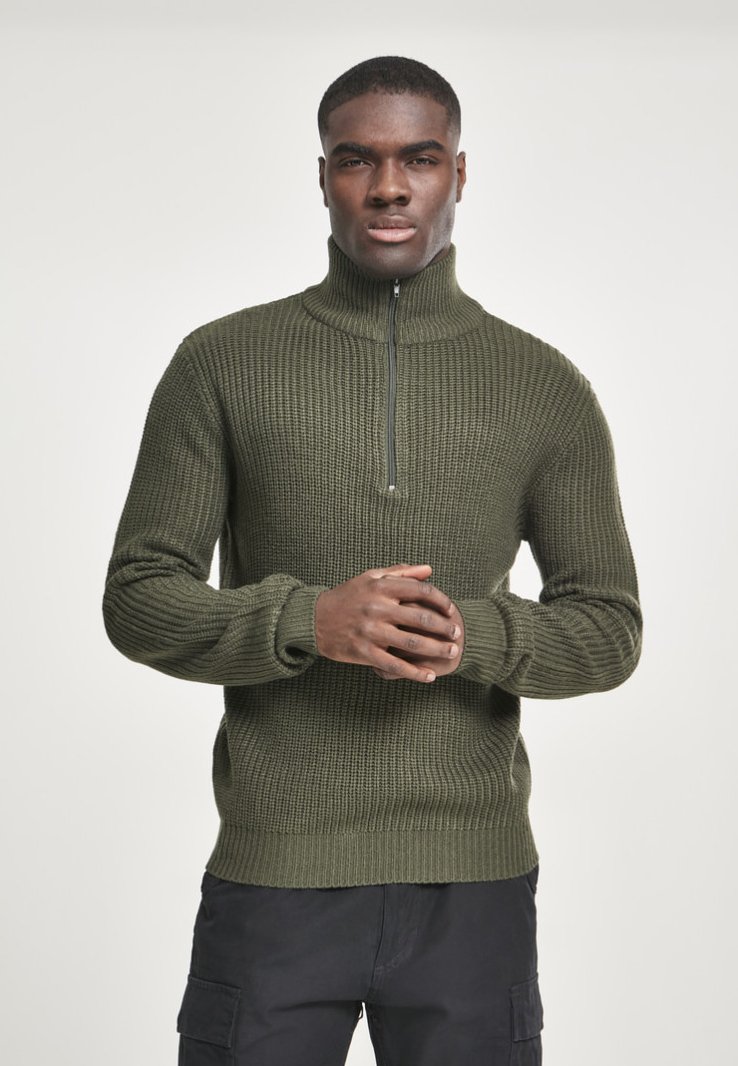 Suéter de punto verde oliva con un alto cuello y media cremallera. Presenta una textura acanalada y puños ajustados, diseñado para un ajuste relajado.