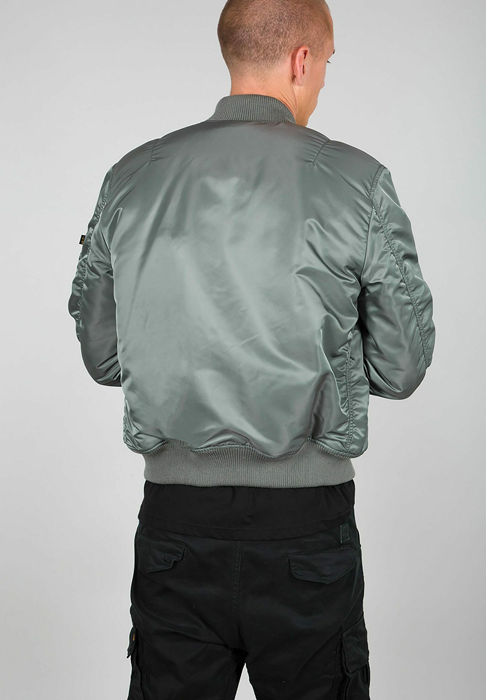 Alpha Industries Bomberjacke - vintage green/petrol meliert - Zalando