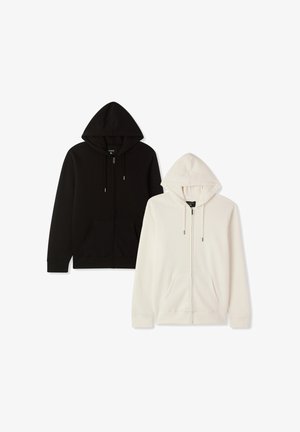 Czarno-białe bluzy z kapturem na całym zamku błyskawicznym, z przednimi kieszeniami i sznurkami, rozłożone na białym tle.