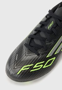 adidas Performance F50 LEAGUE - Chaussures de football pour terrain sec - core black/iron metal-coloured/lucid lemon