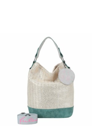 Sac seau tissé beige avec base et bandoulière en daim bleu sarcelle, pochette ronde attachée pour pièces de monnaie, et bandoulière large en tissu détachable avec inscription rose.