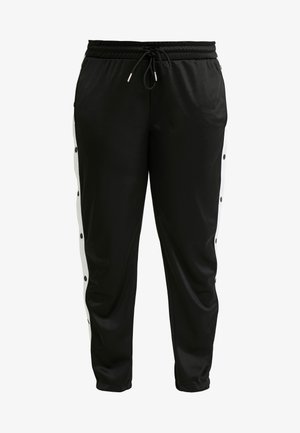 Černé joggery s tkaničkovým pasem, které mají bílé boční panely a doplňky s patentkami podél vnějších stran. Vyrobeno z hladkého materiálu.