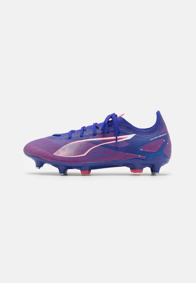 Purple and pink soccer cleat with a textured mesh upper, white logo, and red accents; features a molded outsole and detachable studs.