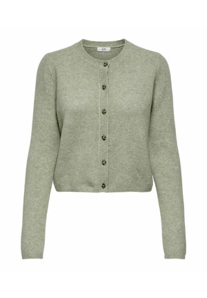 Vaaleanvihreä lyhyt neuletakki, joka on valmistettu pehmeästä materiaalista. Siinä on pitkät hihat ja nappikiinnitys pyöreällä kaula-aukolla, jossa on kuusi nappia.