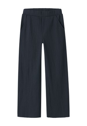 Pantalon bleu marine à jambes larges avec taille élastique et poches latérales, en tissu texturé.
