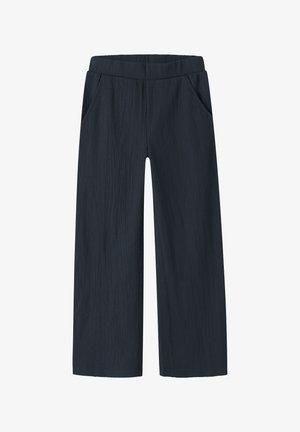 Pantalon bleu marine à jambes larges avec taille élastique et poches latérales, en tissu texturé.