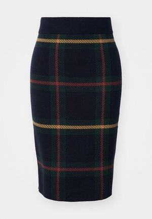 Knit pencil skirt in navy with a green, red, and yellow plaid pattern; features a soft waistband and fitted design.