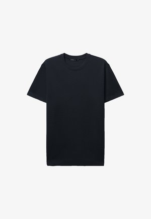 T-shirt nera a maniche corte in cotone, con scollatura rotonda e vestibilità comoda, dalla texture uniforme e liscia.