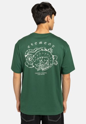 Green cotton t-shirt featuring a large white graphic of a serpent design on the back and "ELEMENT" text above it. Short sleeves.