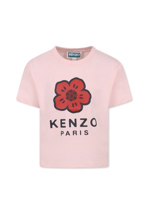 Light pink cotton t-shirt featuring a large red flower graphic and black "KENZO PARIS" text. Short sleeves and round neckline.