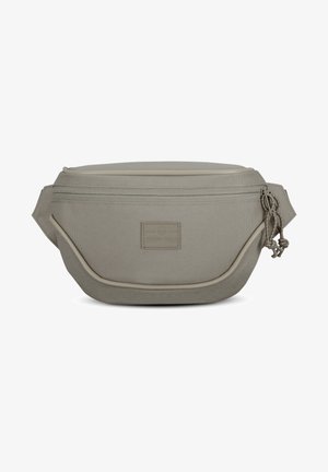 Bolso bandolera de tela beige con un compartimento principal con cremallera, de forma redondeada y superficie texturizada, que presenta una etiqueta de marca en la parte frontal.