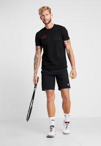 Fila SHORTS SANTANA - Spordišortsid - black