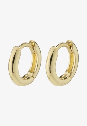 Goldene Creolen mit einem glatten, glänzenden Finish. Abgerundetes Design mit einem nahtlosen Scharnierverschluss, das eine kompakte, minimalistische Form hat.