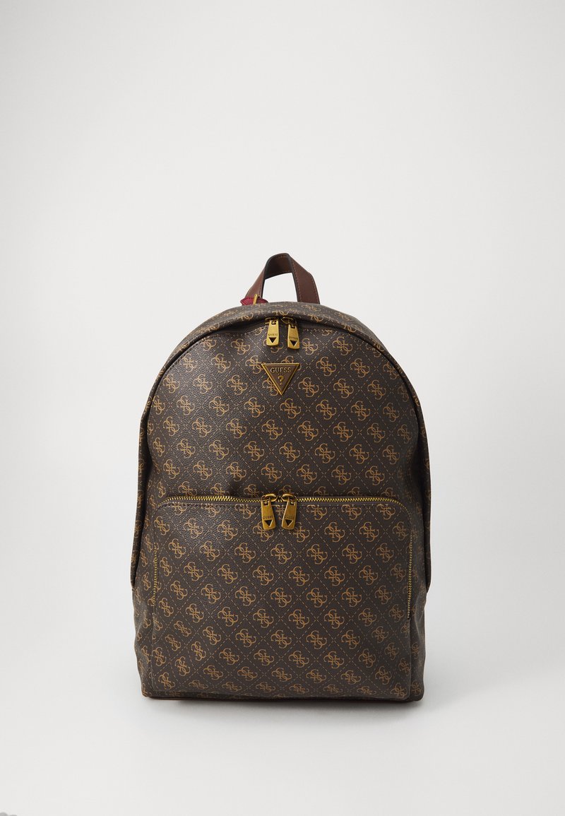 Sac à dos à motifs marron avec quincaillerie dorée, fermeture à double zip et logo. Fabriqué en matériau texturé avec un design arrondi.