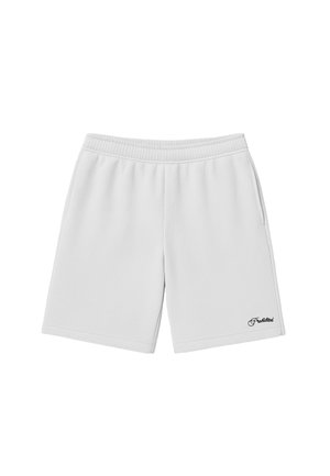 Pantaloni scurți albi din material tip prosop cu talie elastică și buzunare laterale, având un mic text negru "Interzis" pe piciorul inferior stâng.