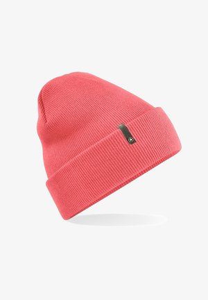 Pink knitted beanie hat with a folded cuff. Features a textured ribbed pattern and a small black tag with a logo on the side.