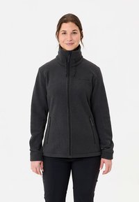 Fleecejack in antracietgrijs met hoge kraag, ritssluiting aan de voorkant en twee zijzakken. Heeft een gladde textuur en minimale branding.